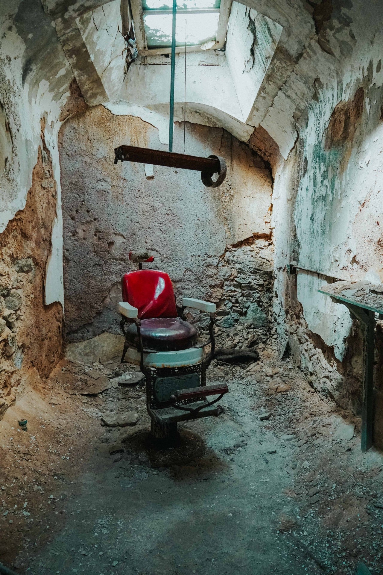 Barber chair inside of Eastern State Penitentiary in Philadelphia with Fade Room barbershop