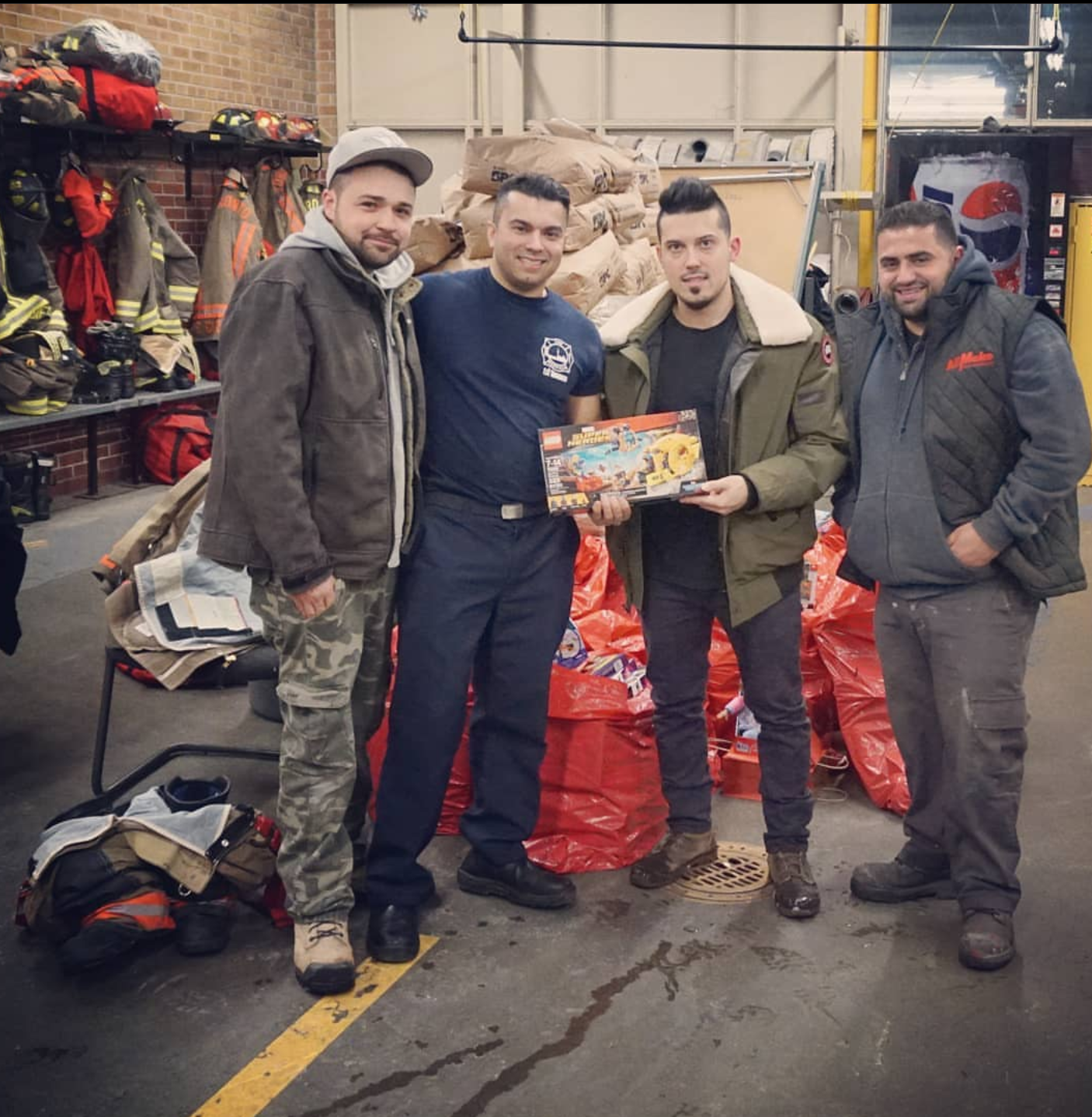 Toronto Firefighter Christmas Toy Drive - Fade Room donates to children