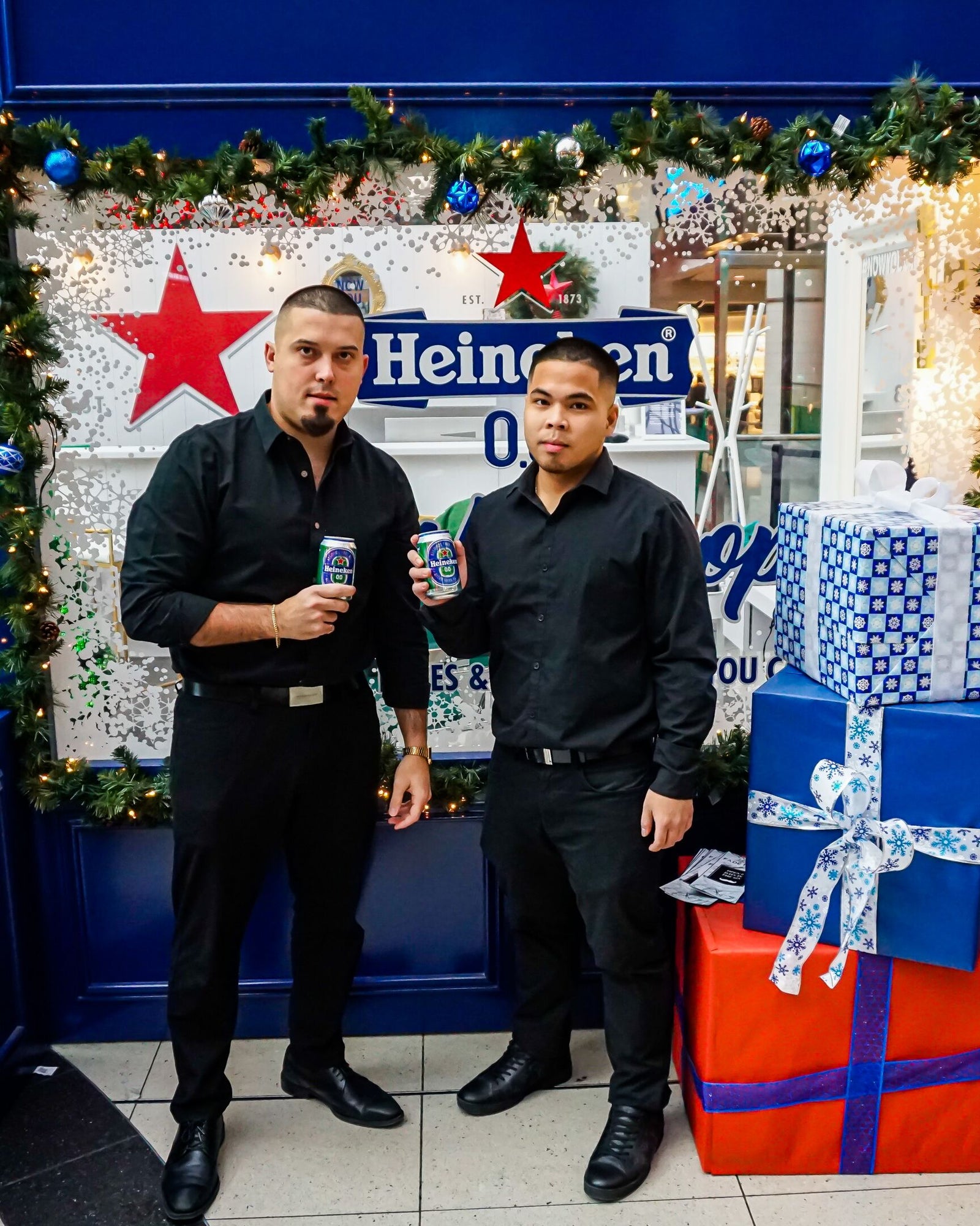 Heineken 0.0 Christmas Holiday Pop-up at Eaton Centre Toronto with Fade Room barbershop. Claudio Ferreira (left), Emmanuel Andrei Climaco (right)